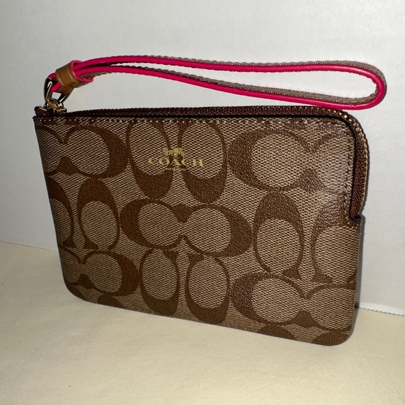 COACH Signature "C" print Wristlet, in Khaki & Neon Pink(wrist strap) - Picture 1 of 3